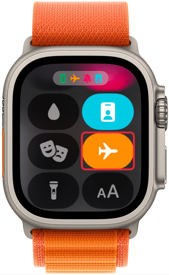 apple watch control center with a red box around an orange airplane icon