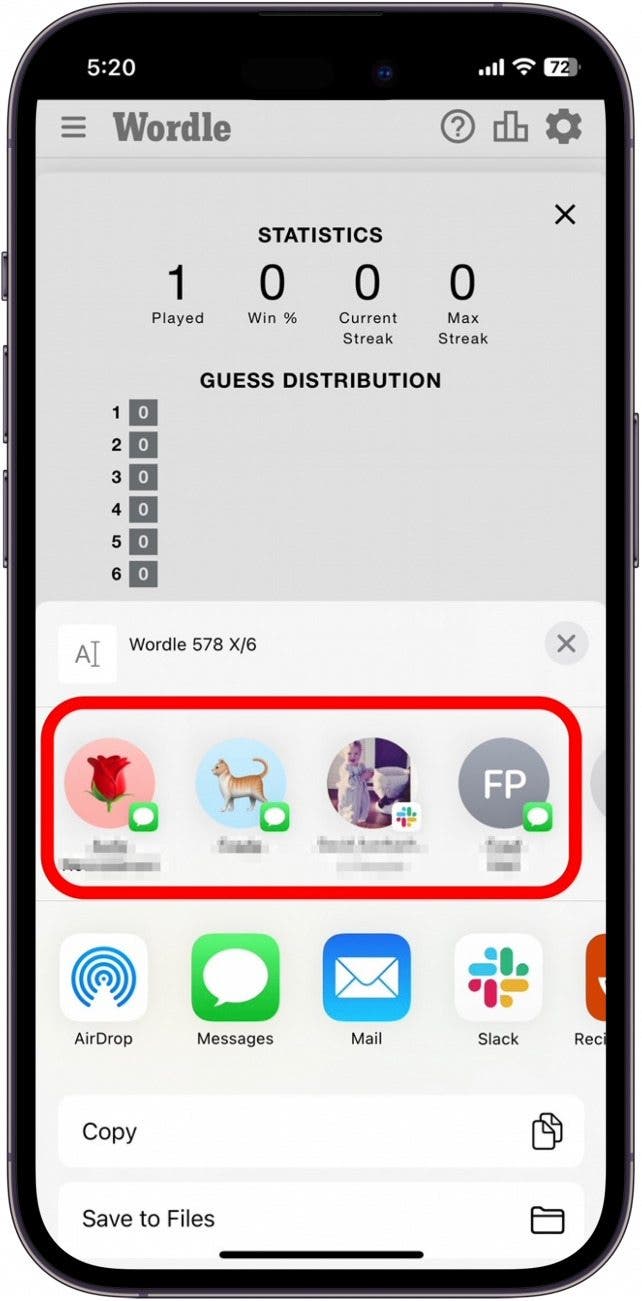 Tap the contact you want to share your Wordle score with. 