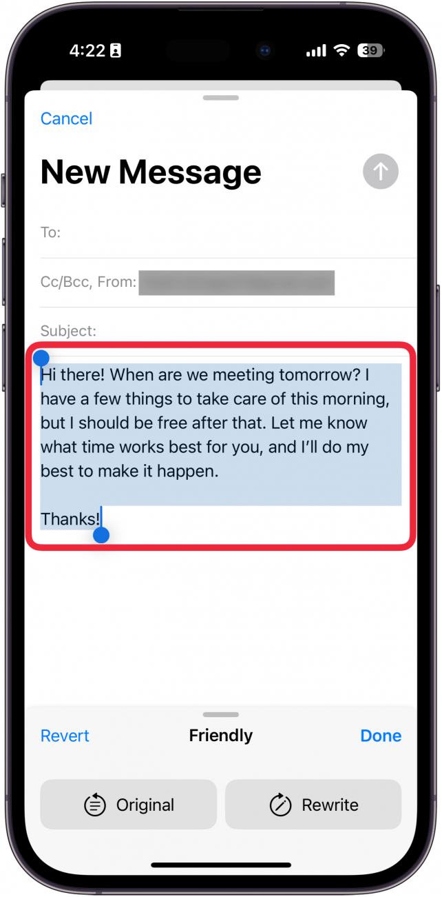 iphone mail app, new email screen displaying friendly writing tools menu with a red box around rewritten text that now reads more friendly