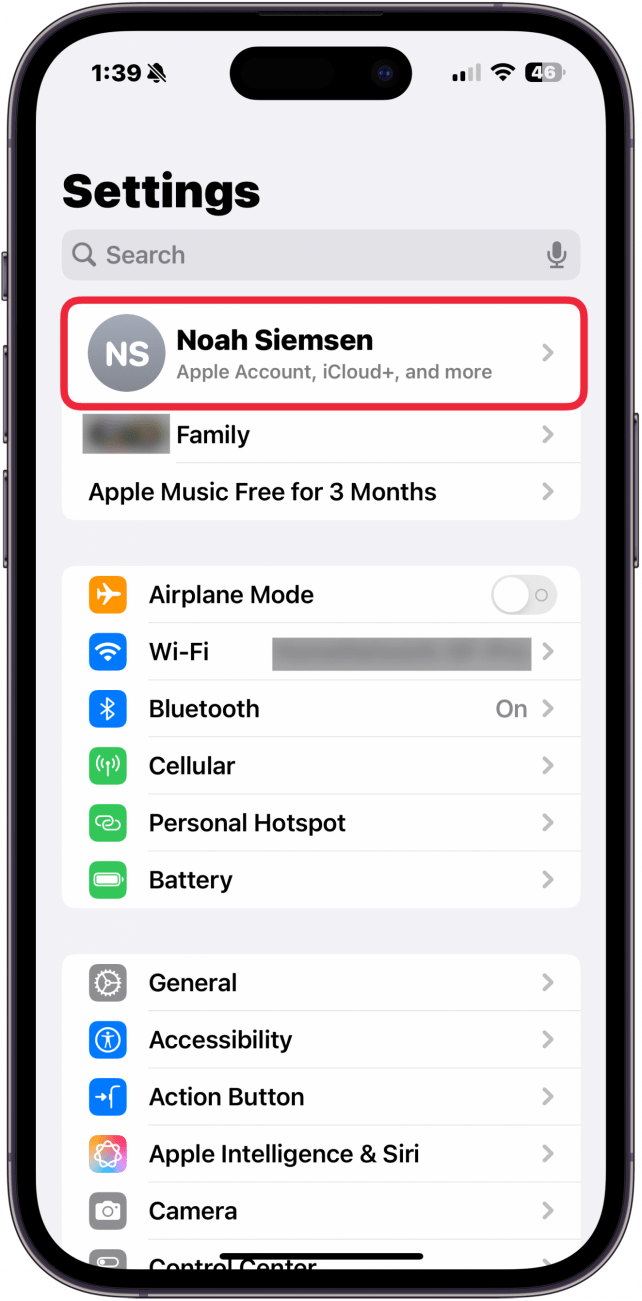 iphone settings app with a red box around Apple account