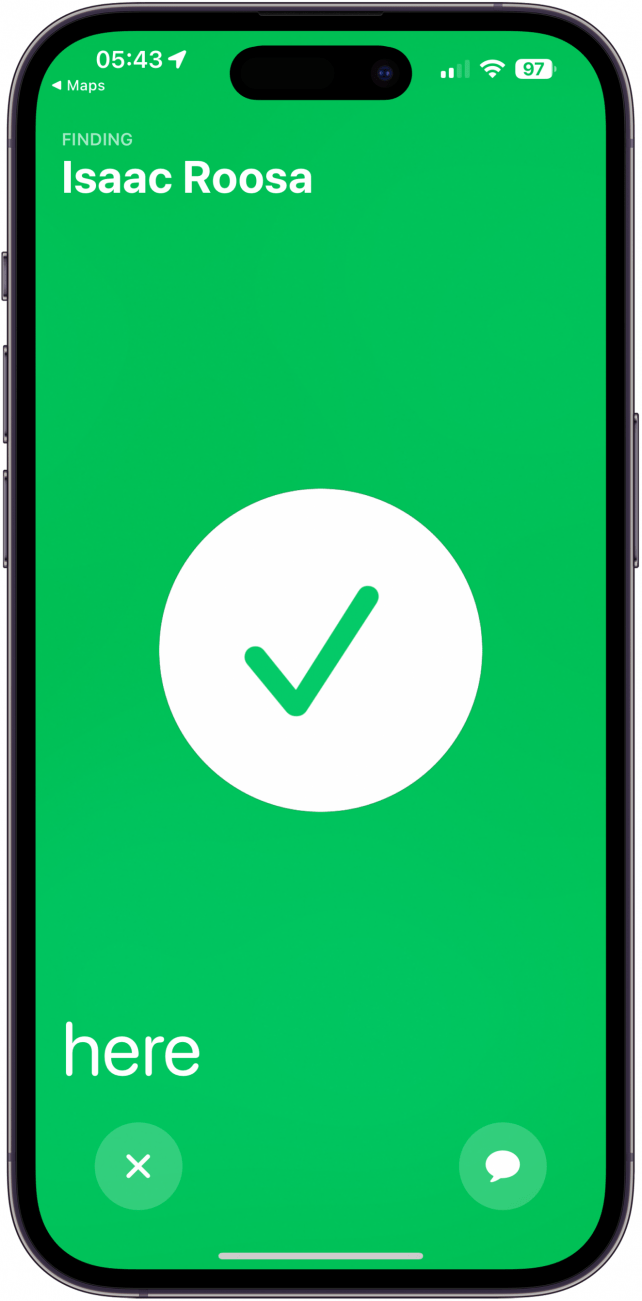 iphone precision finding screen showing a green check mark, indicating the friend has been located