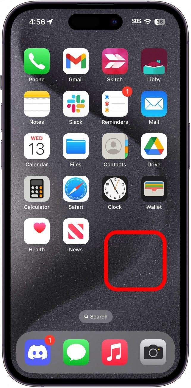 iphone home screen with a red box around an empty space, indicating to tap and hold that space