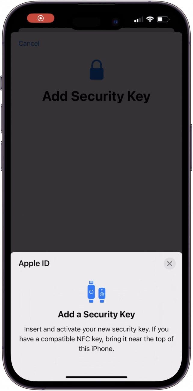 Insert or hold your security key up to your iPhone