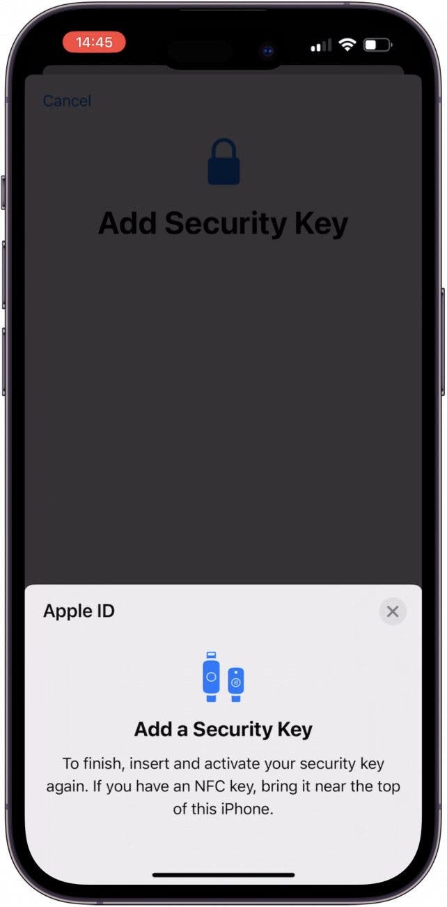 Insert or hold your security key up to your iPhone again