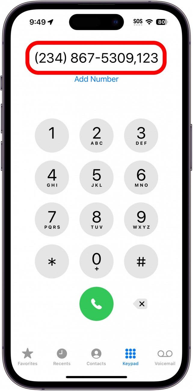 iphone phone app with a red box around the phone number that has been dialed with an extension added to the end