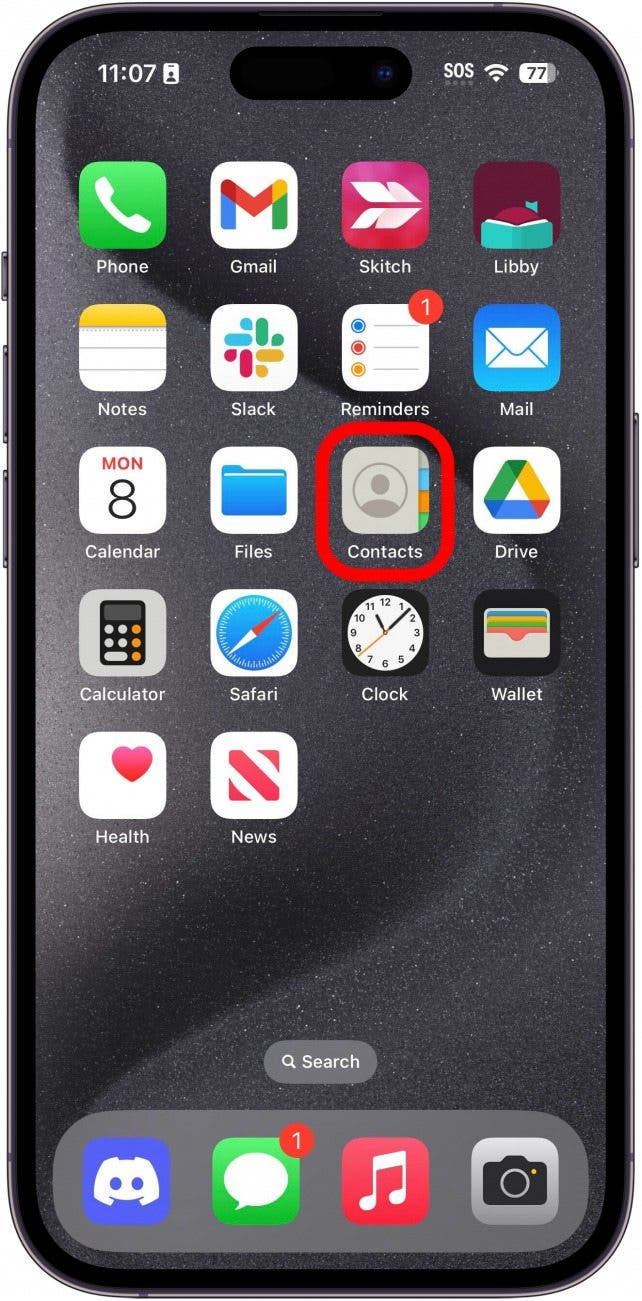 iphone home screen with a red box around the contacts app