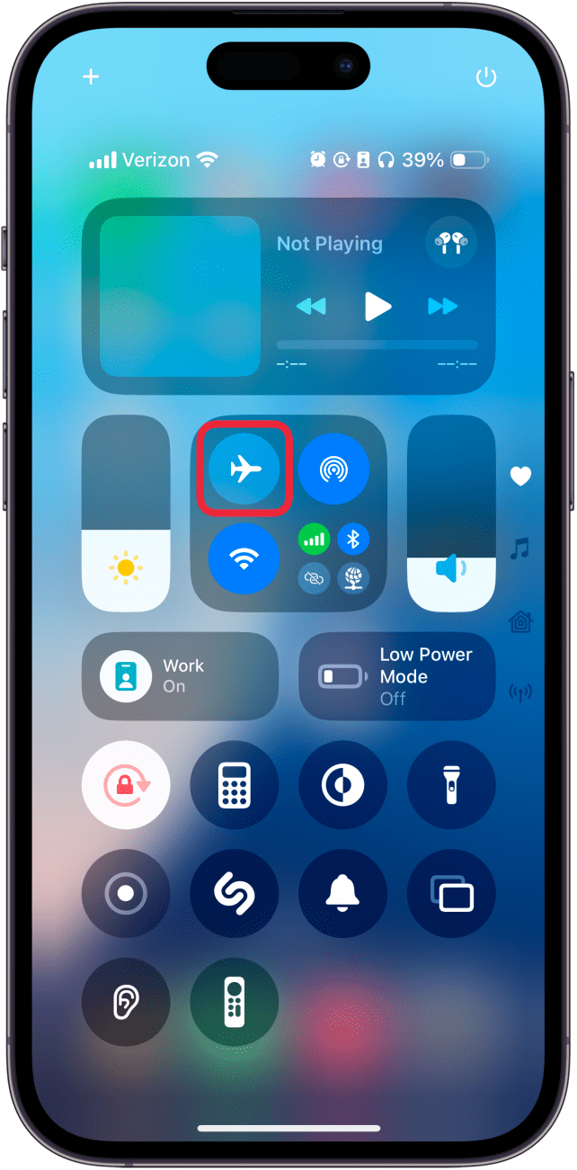 iphone control center with a red box around a gray airplane icon