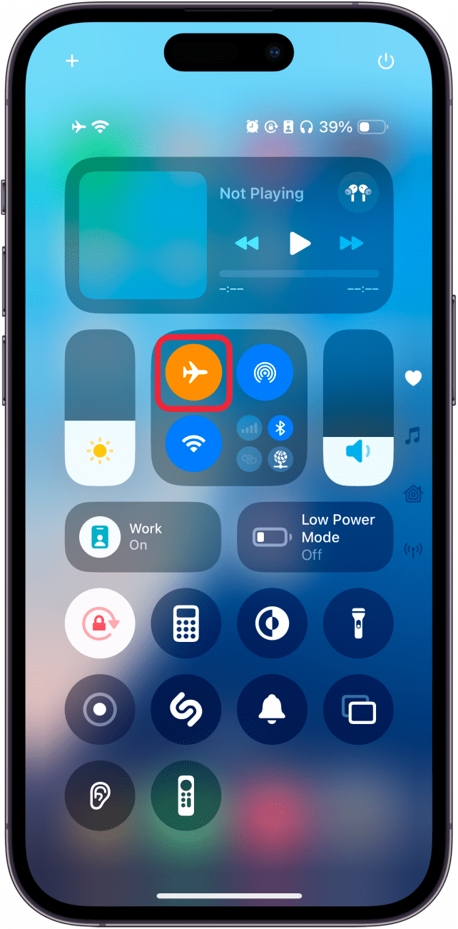 iphone control center with a red box around an orange airplane icon