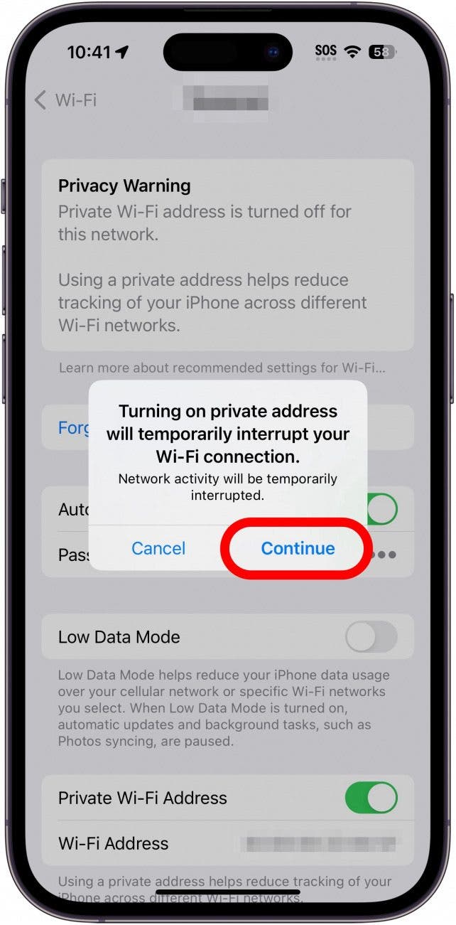 iphone wi-fi network settings with a pop up warning the user that the device will briefly disconnect from wi-fi while enabling the private wi-fi address feature