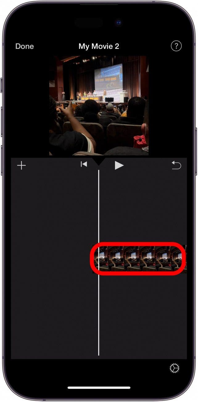 iphone imovie app with video clip in timeline circled in red