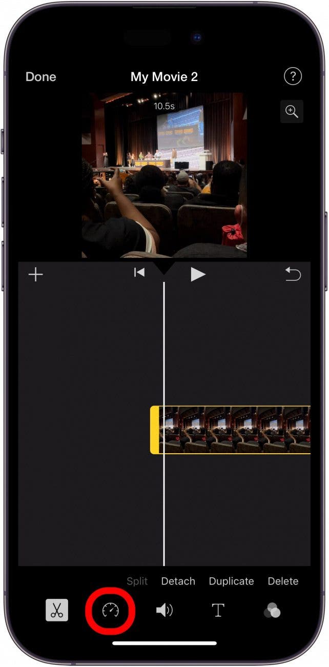 iphone imovie app with playback speed button circled in red