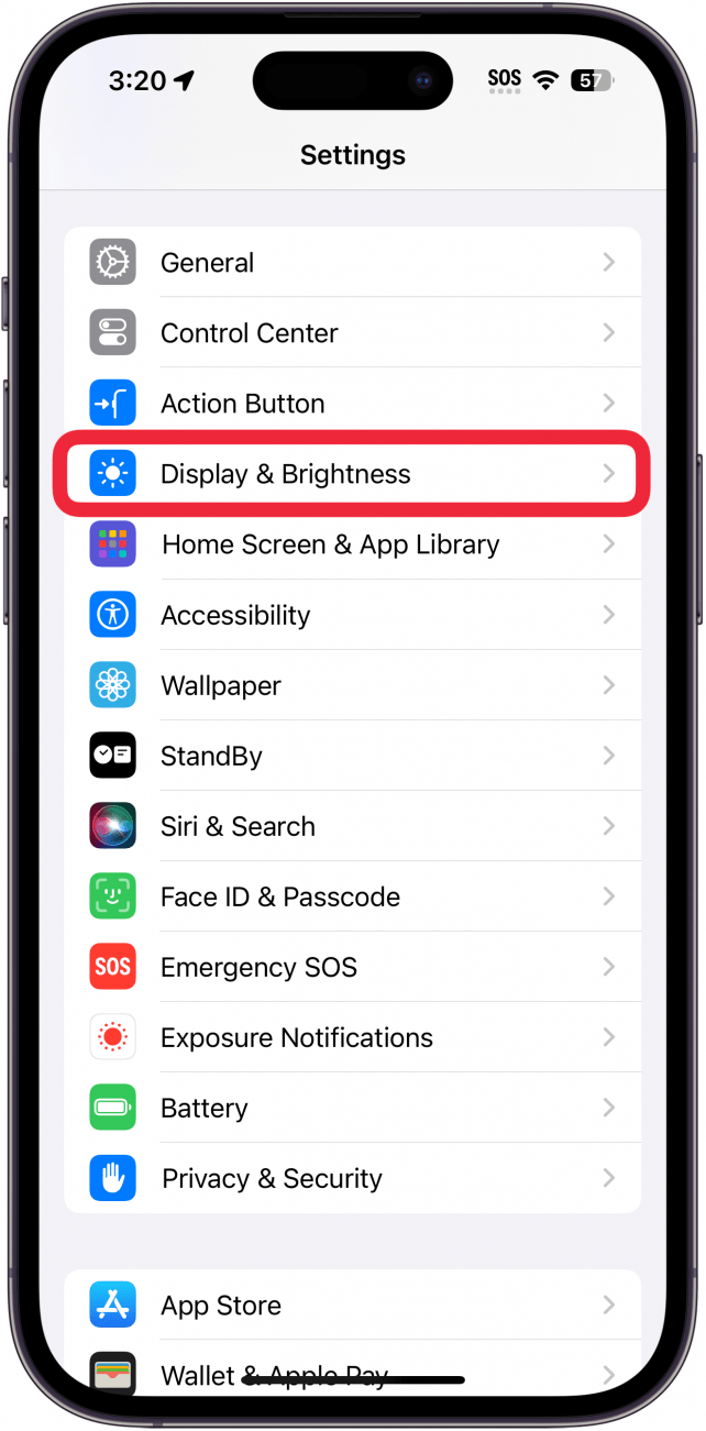 iphone settings with a red box around display and brightness