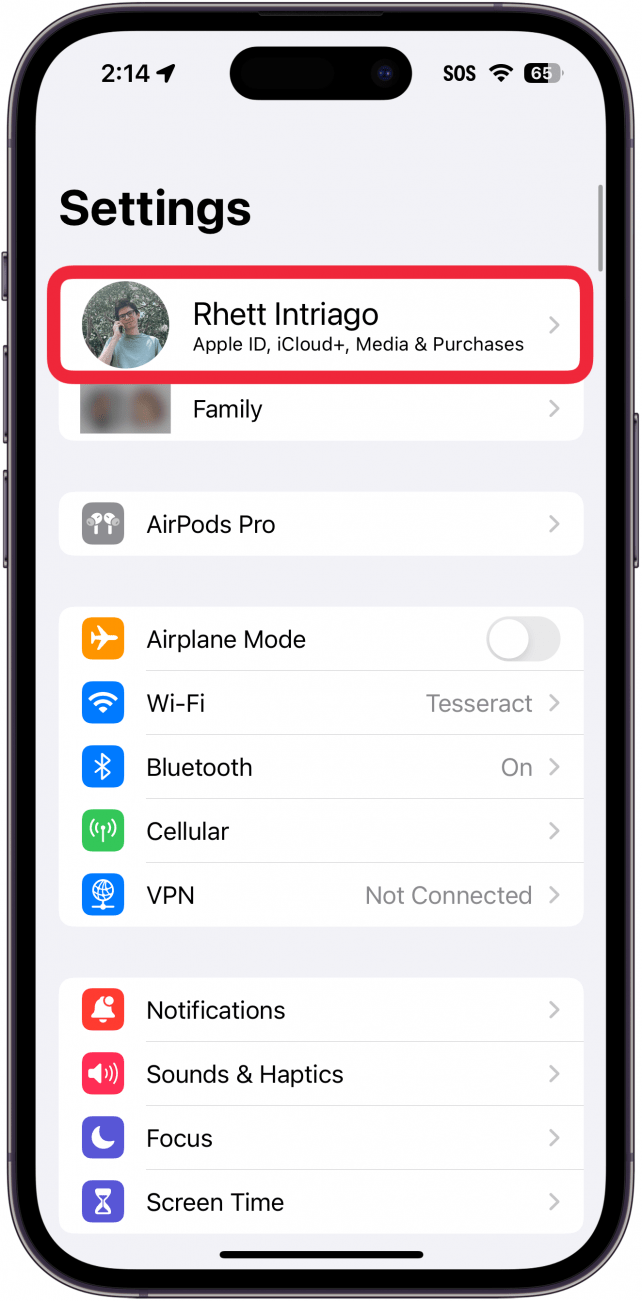 iphone settings with a red box around apple id at the top of the menu