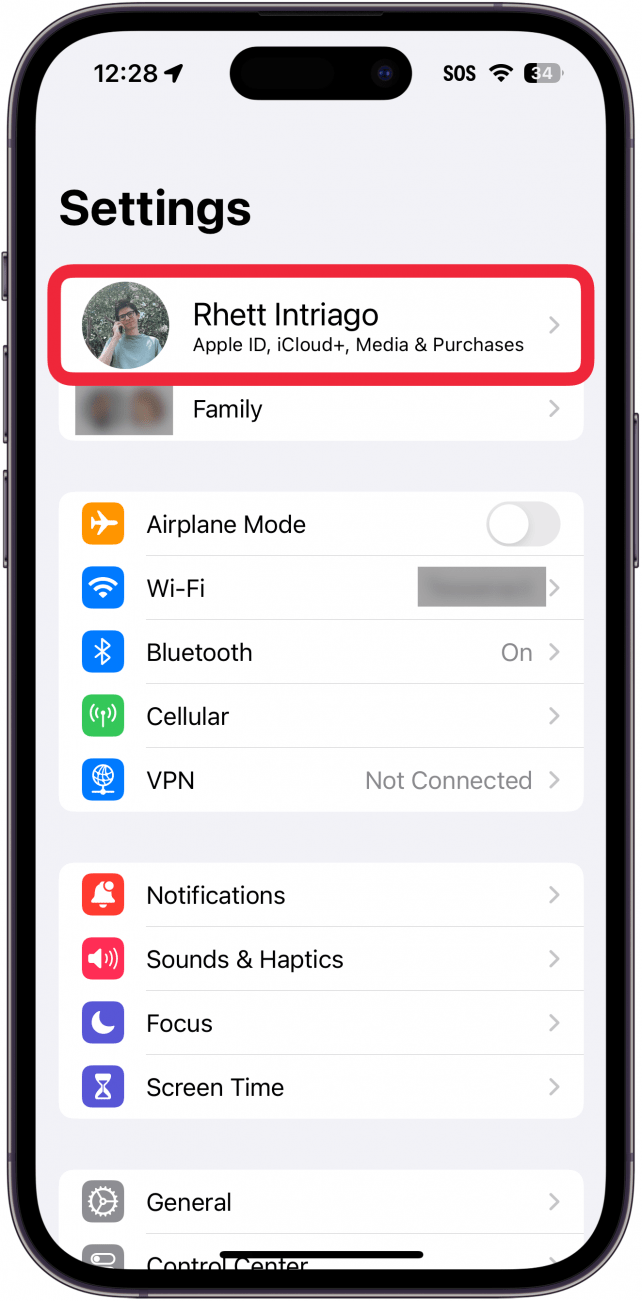 iphone settings with a red box around apple id name