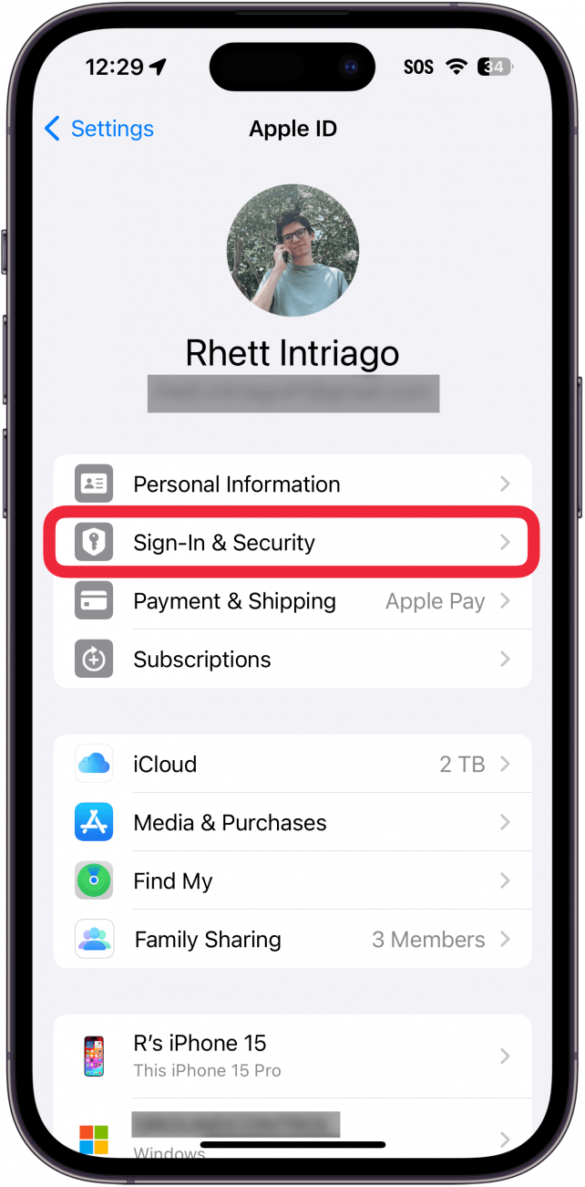 iphone apple id settings with a red box around sign in and security