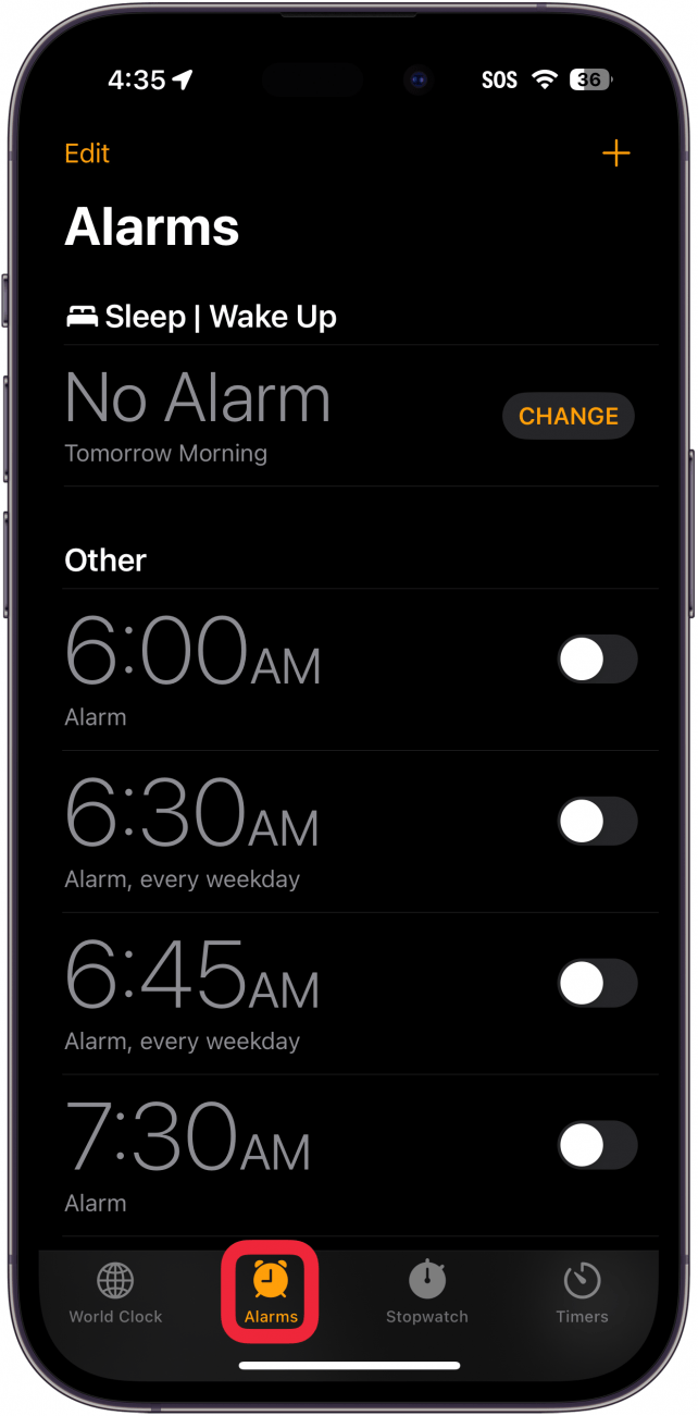 iphone clock app with a red box around alarms tab