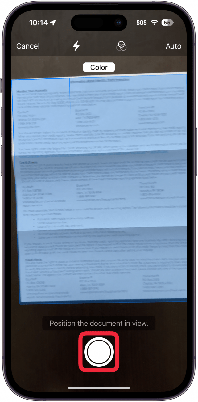 iphone files app scan documents screen with a blue overlay on the document, indicating that the camera has detected a document to scan, with a red box around the shutter button