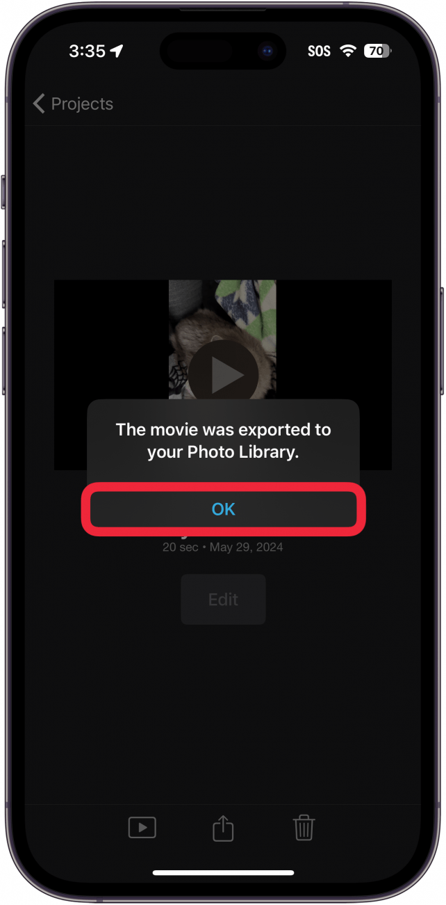 iphone imovie app export project screen displaying a pop up indicating that the export was successful with a red box around ok button