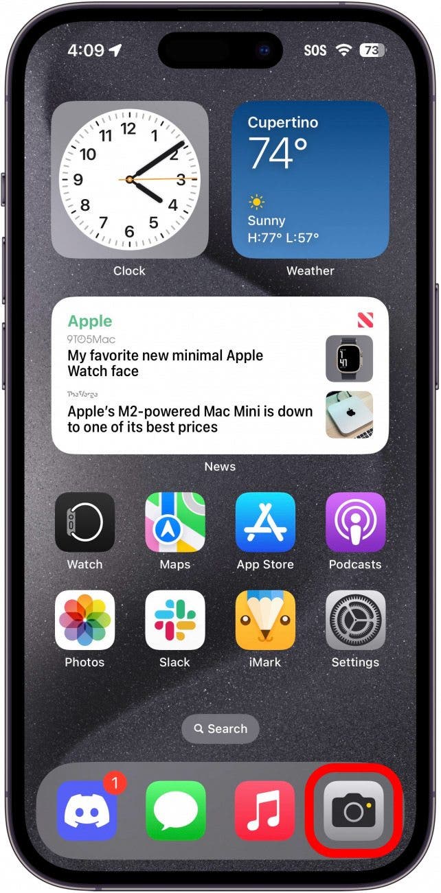 iphone home screen with a red box around camera app