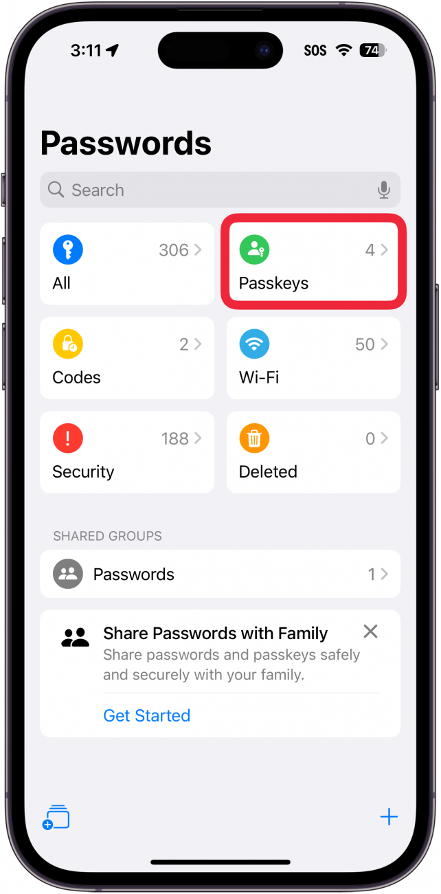 iphone passwords app with a red box around passkeys