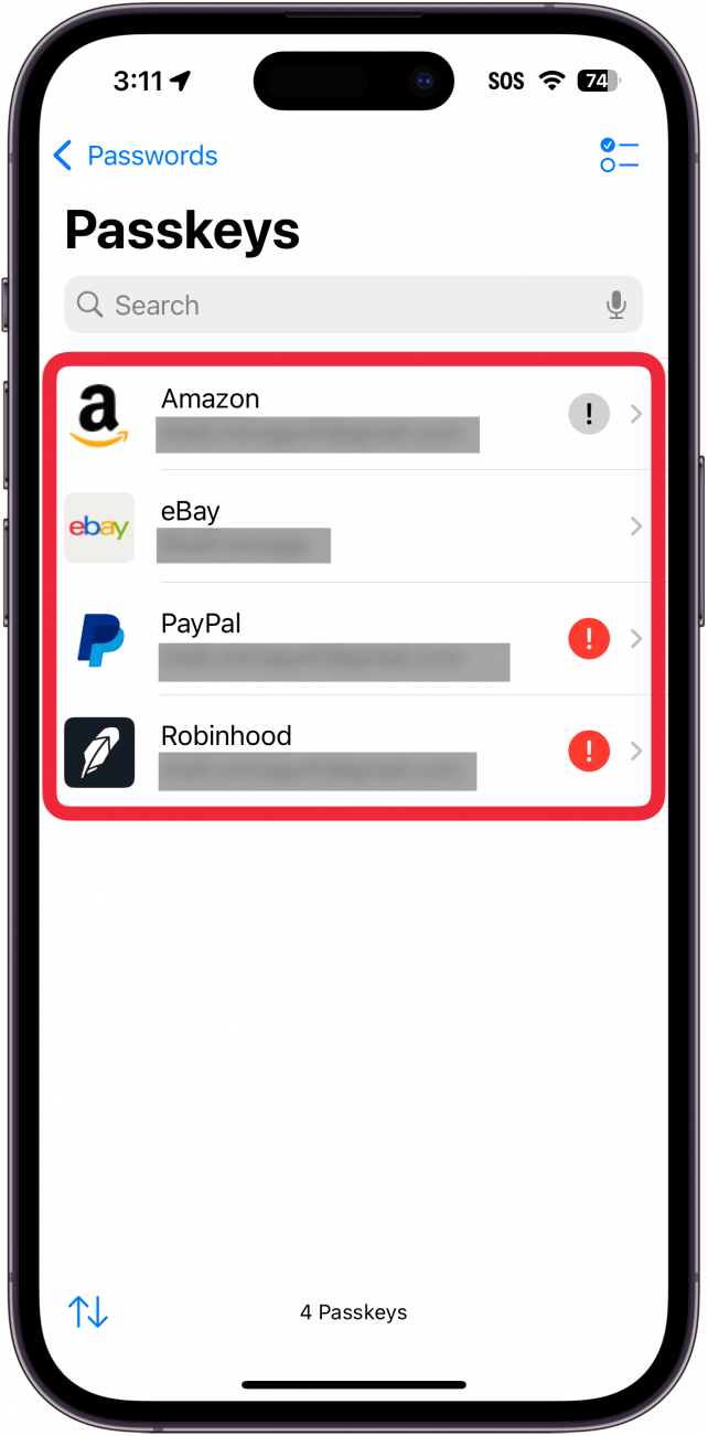 iphone passwords app passkeys screen with a red box around a list of passkeys