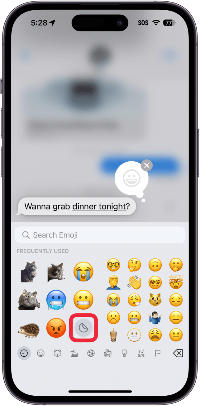 iphone messages app tapback menu displaying emojis keyboard with a red box around stickers button