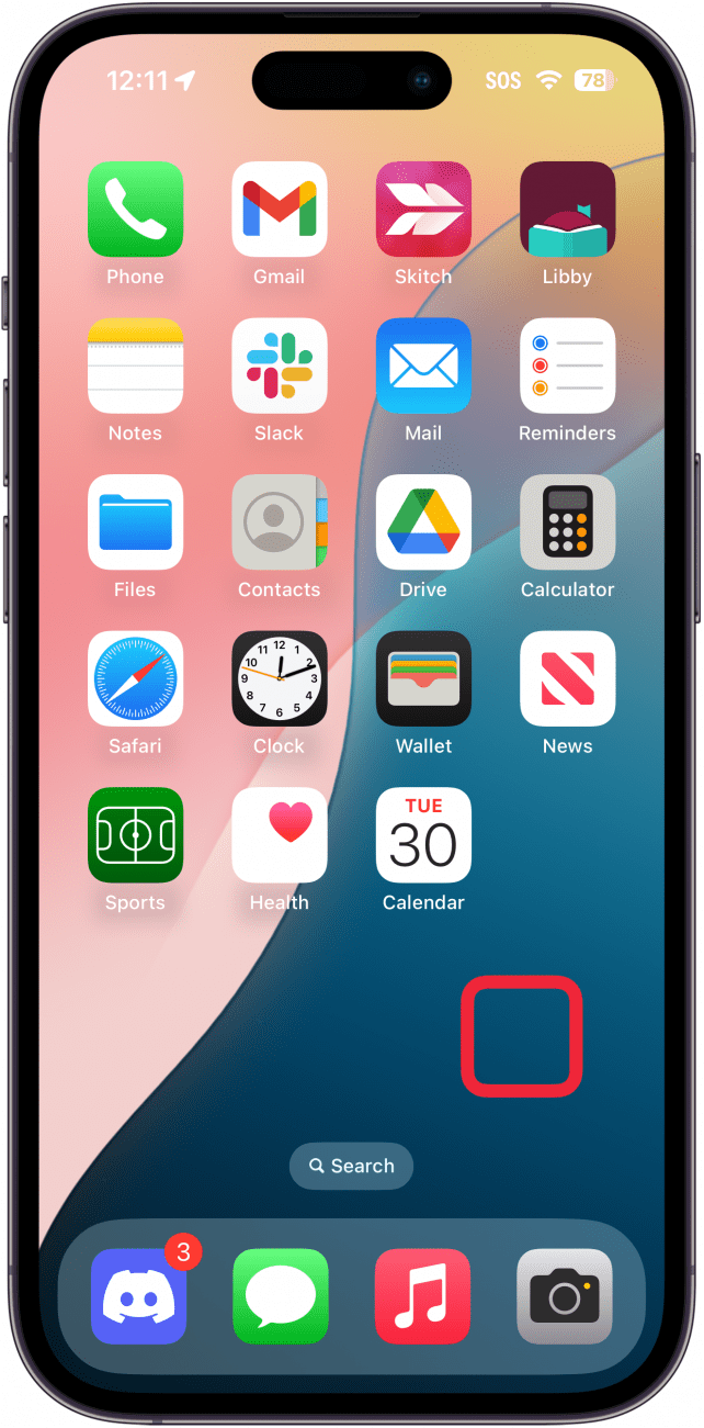 iphone home screen with a red box around an empty area, indicating to tap and hold