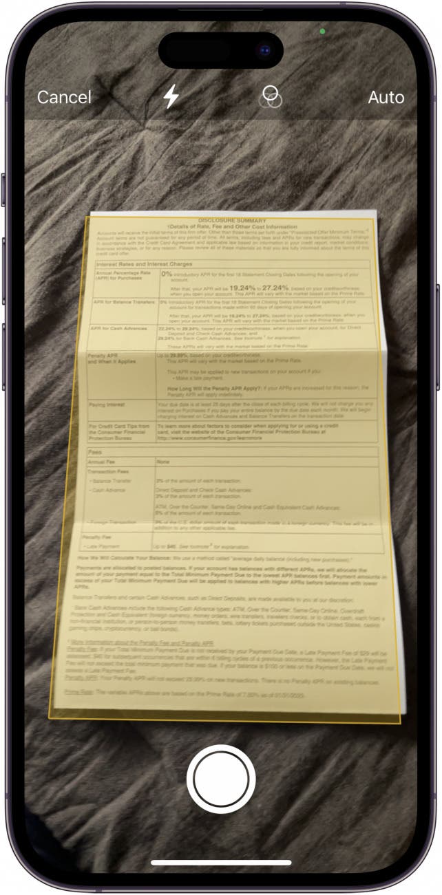 the Notes app screen with a yellow document centered in the phone window.