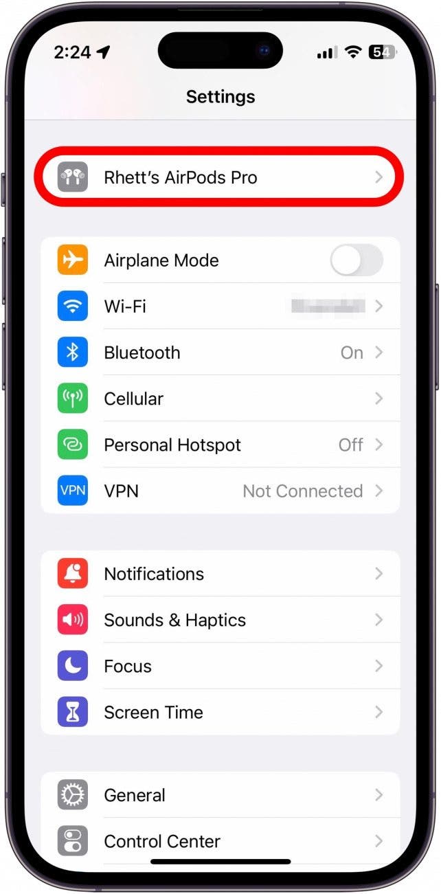 Open your Settings app, and tap your AirPods at the top of the screen.