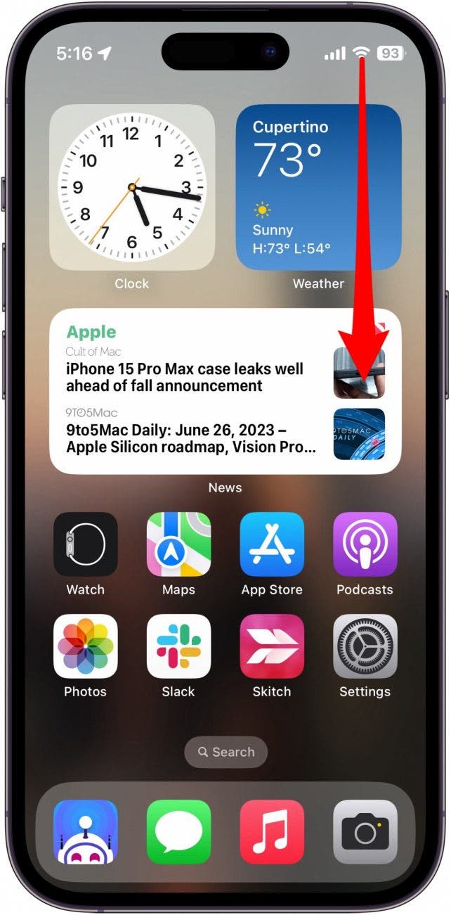 screenshot of iphone home screen with red arrow extending from the upper right edge to demonstrate a swipe down gesture