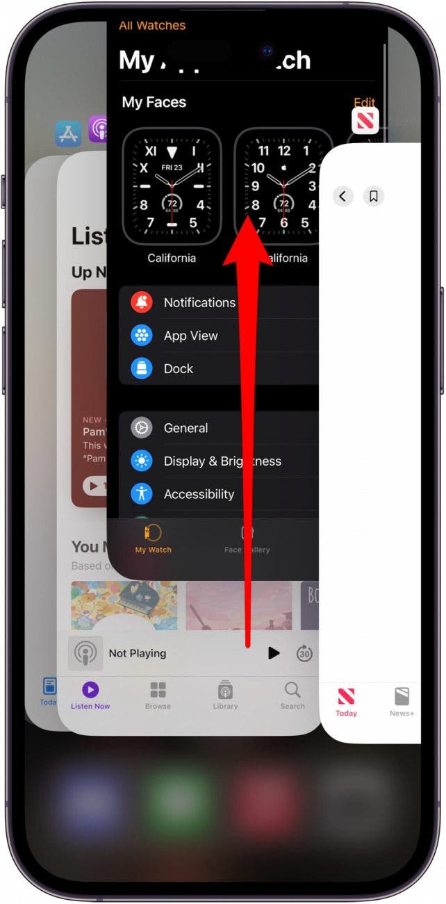 iphone app switcher with one app slightly raised and a red arrow pointing upward from the center of the screen