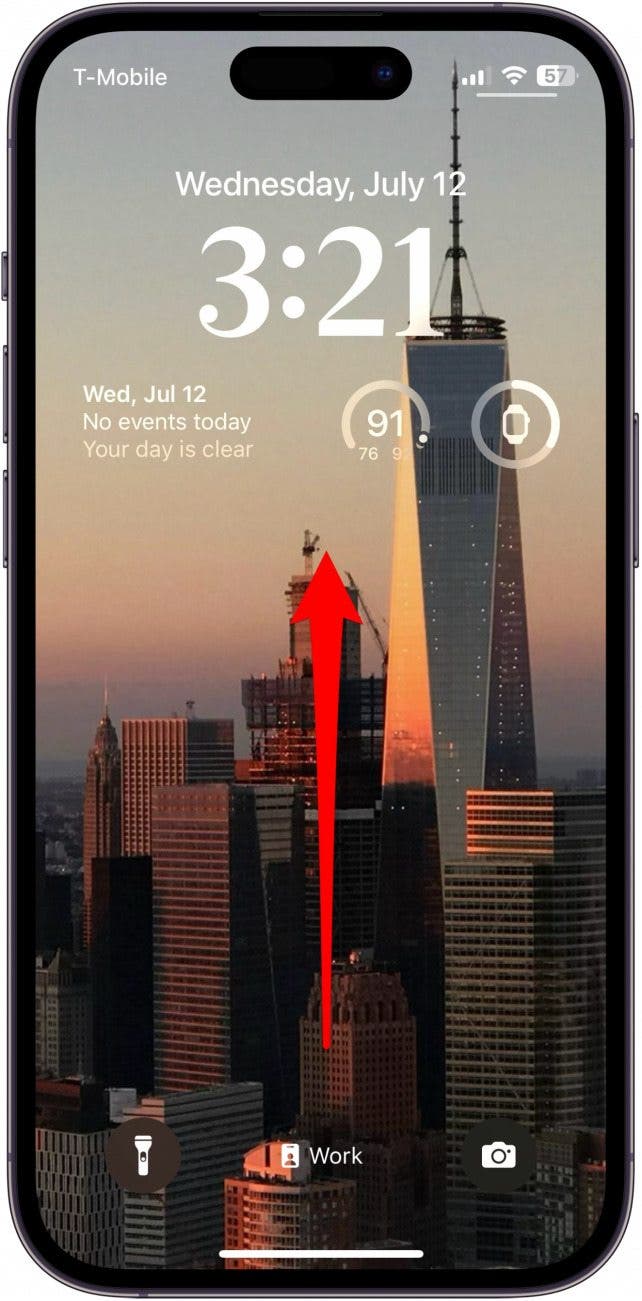 iphone lock screen with red arrow pointing up from center of screening, indicating to swipe up from center of screen