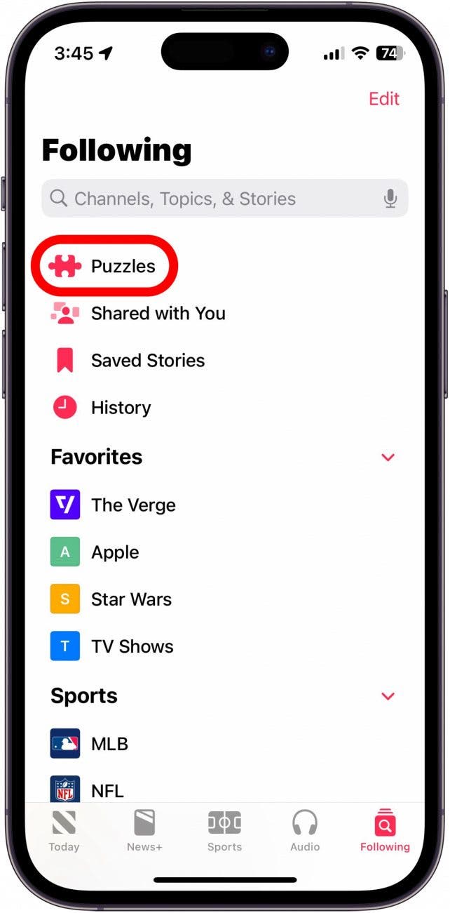 apple news app with puzzles button circled in red