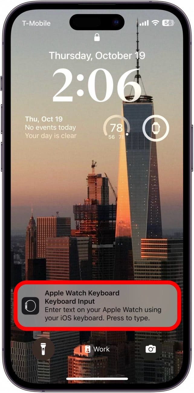 iphone lock screen with apple watch keyboard notification circled in red