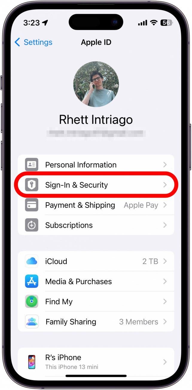 iphone apple id settings with a red box around sign in and security