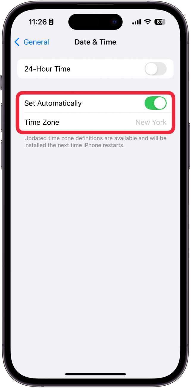 iphone date and time setting with a red box around set automatically toggle and the time zone which is set to new york