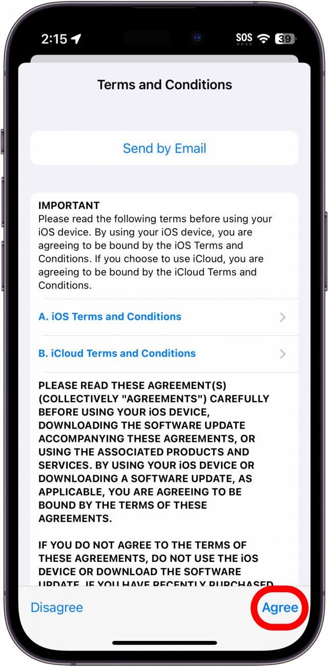 iphone software update process displaying terms and conditions with a red box around agree button