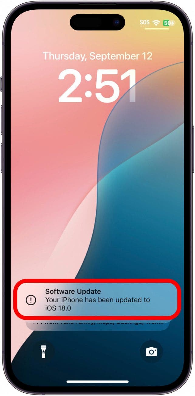 iphone lock screen displaying a notification that the software has been updated to iOS 18