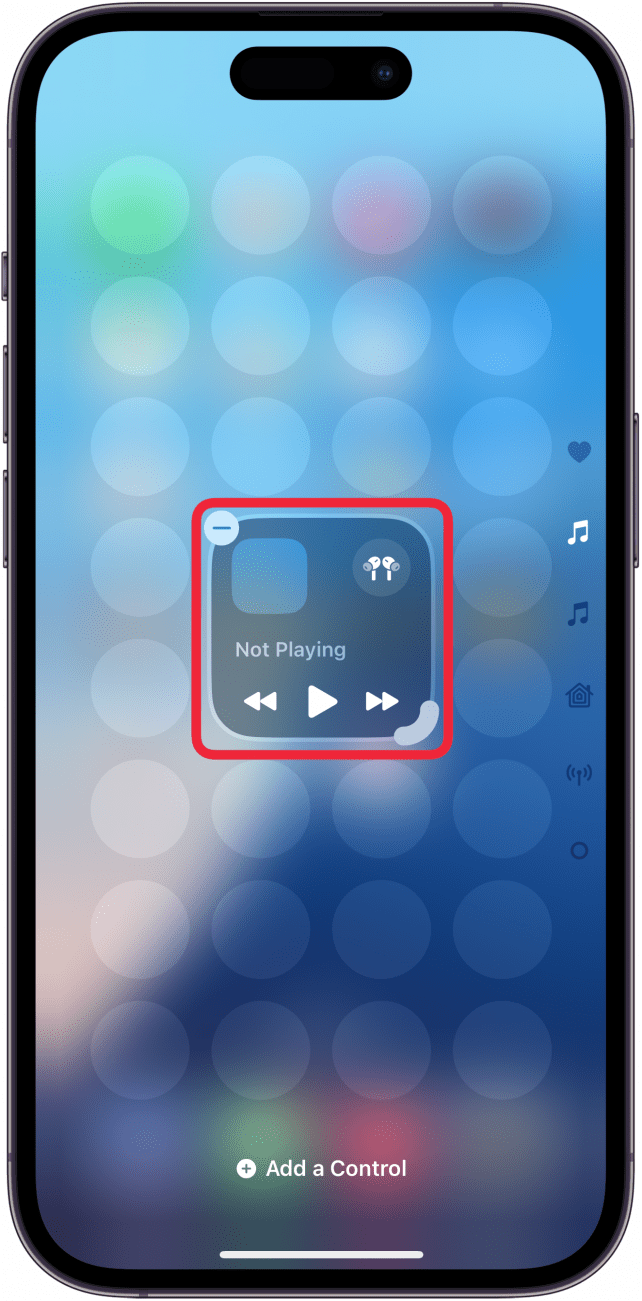 iphone control center in edit mode with a control in the center of the screen with a red box around it, indicating that controls can be placed anywhere on the screen