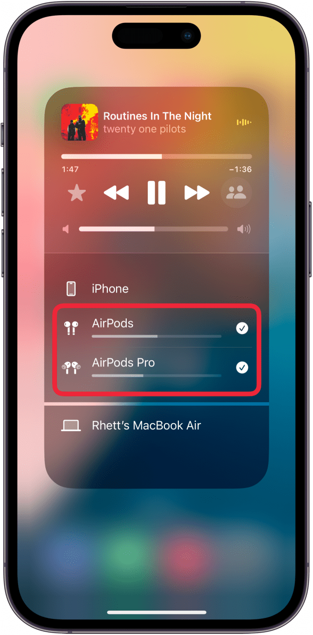 iphone control center audio menu displaying two connected airpods with separate volume sliders