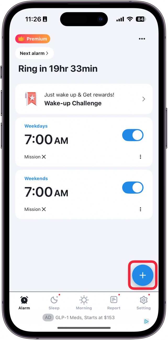 iphone alarmy app with a red box around plus icon