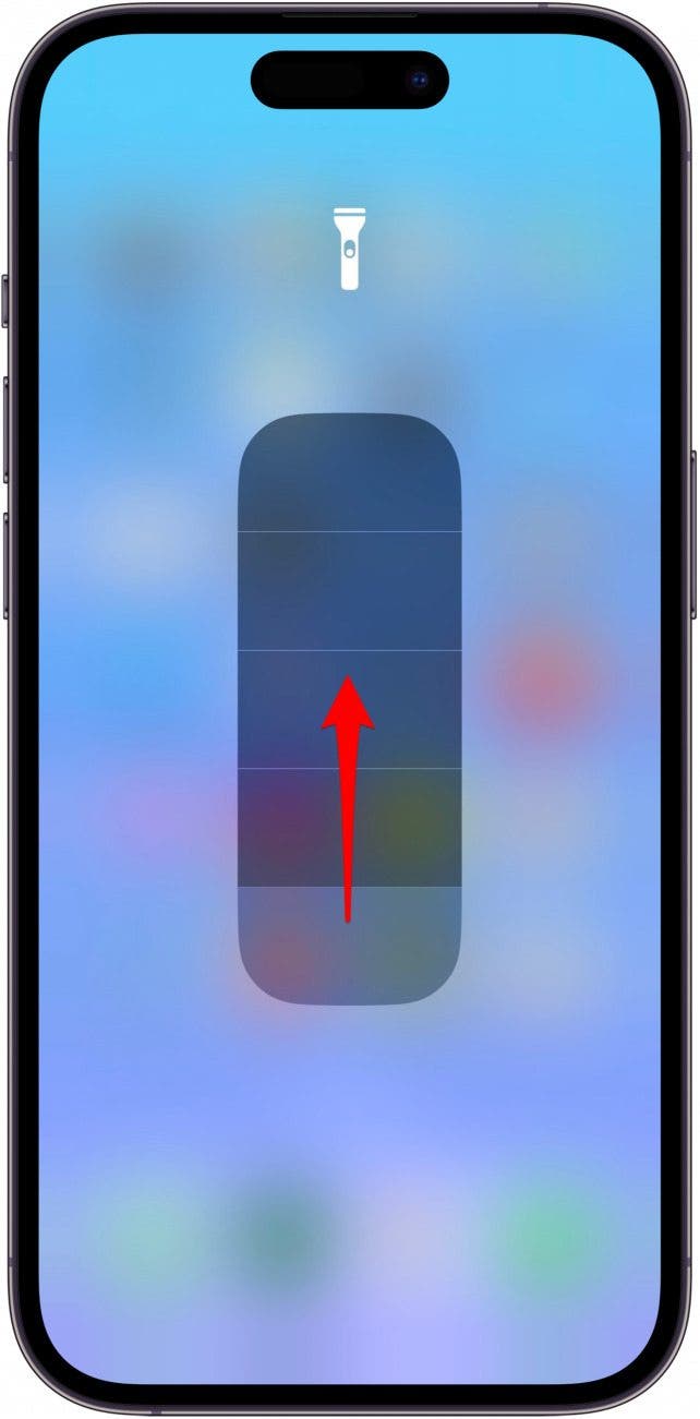 A segmented bar will appear on screen. Swipe up on the bar to turn up the flashlight's brightness. 