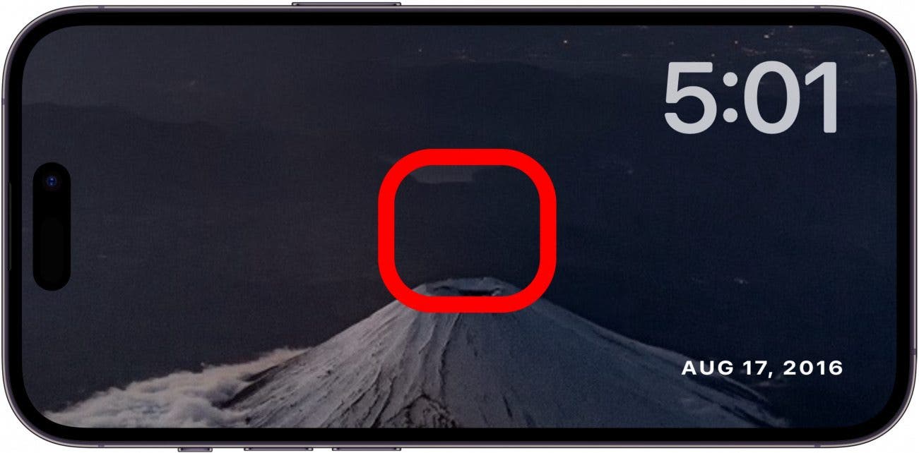 iphone standby photos screen with red box in the center of the screen, indicating to press and hold on the screen briefly