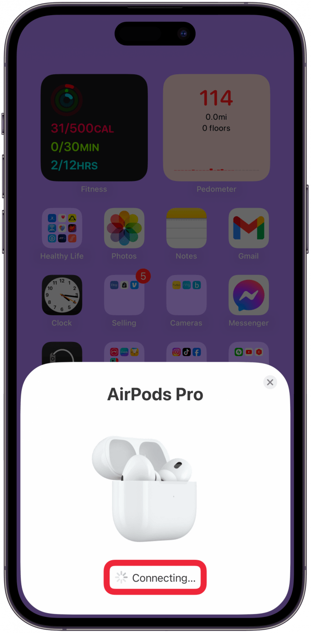 You can release the button once the status light changes to white. Your AirPods will begin connecting.