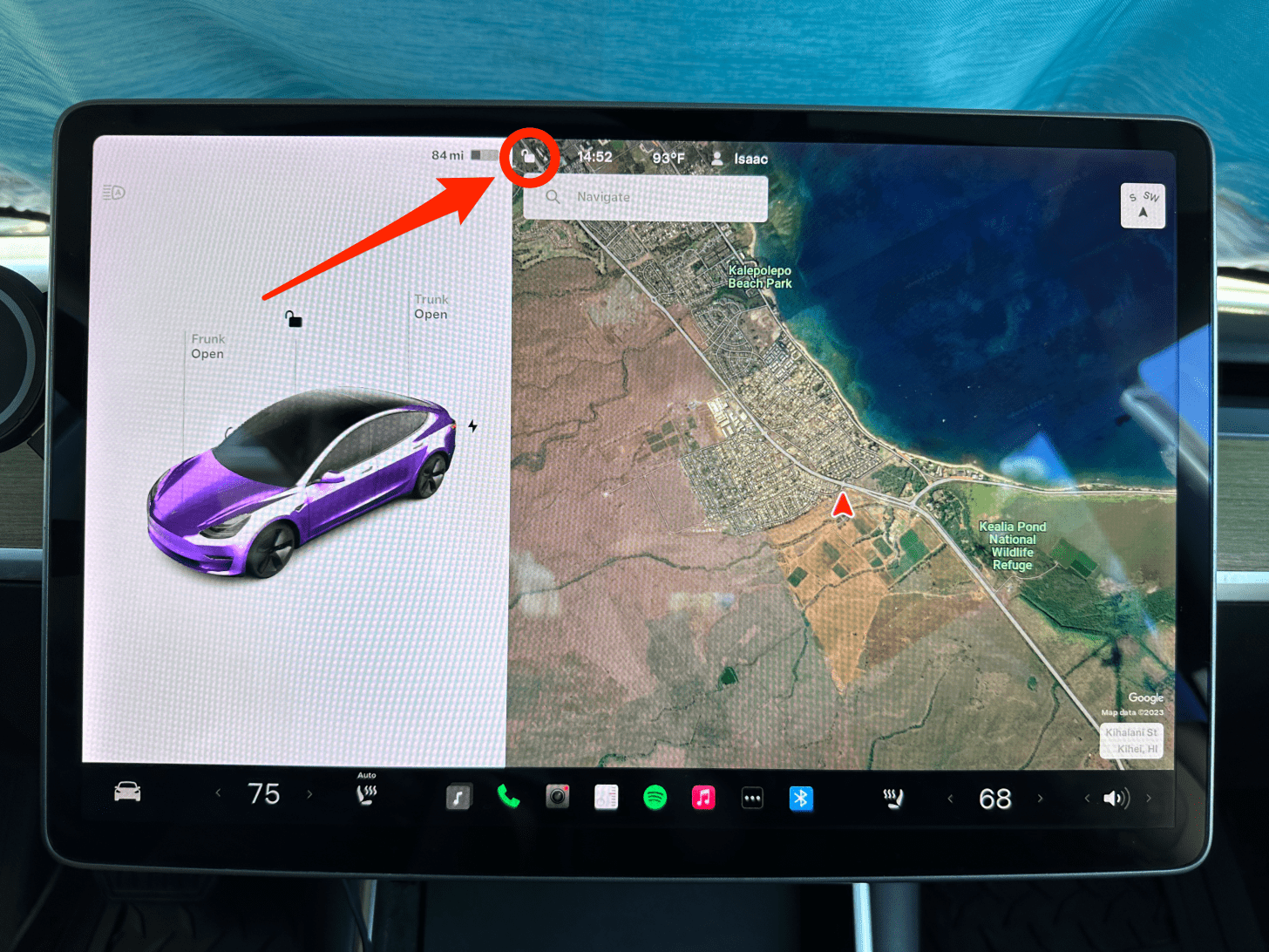 Tap the lock/unlock icon on the Tesla display.