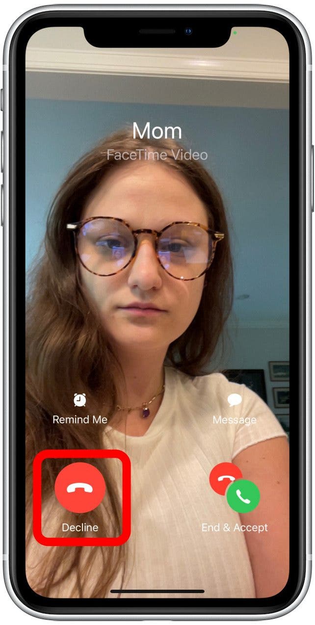 To reject an incoming call and continue your current FaceTime call, tap Decline.