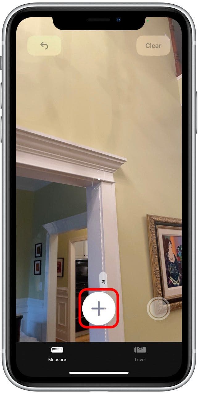If you'd like to measure from the endpoint of your last measured line, tap the plus sign while the white point is over the previous endpoint, then move your phone again to create another measurement as before.
