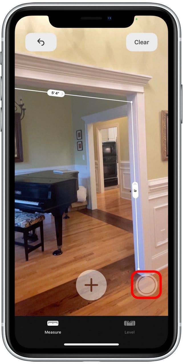 To take a photo of a completed measurement, tap the Shutter button to the right of the plus sign.