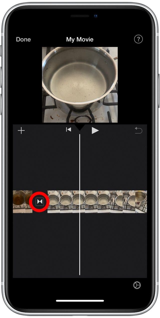 Swipe to scroll through the combined video and tap on the transition icon between clips.