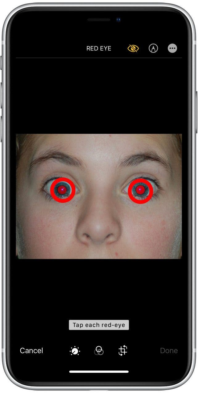 Tap each red eye in the image where you want to apply red eye correction. 